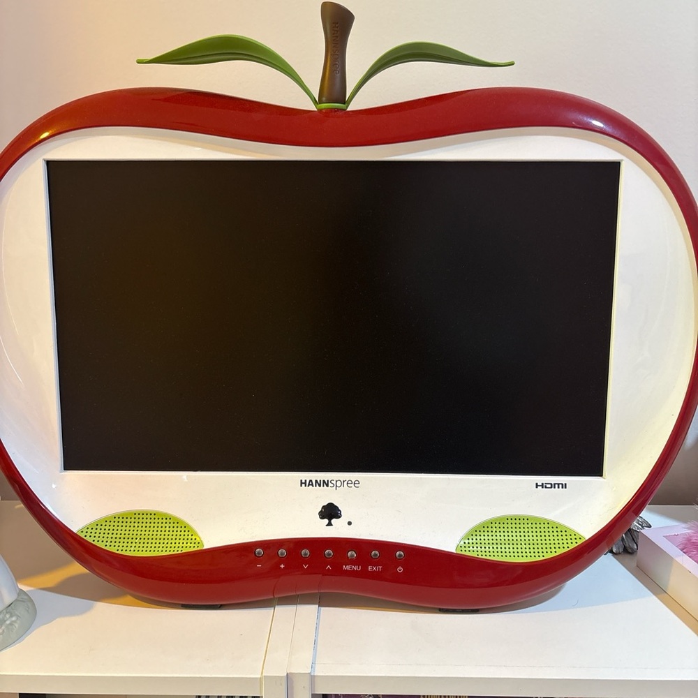 Red Apple-Shaped All-in-One Monitor with Green Accents